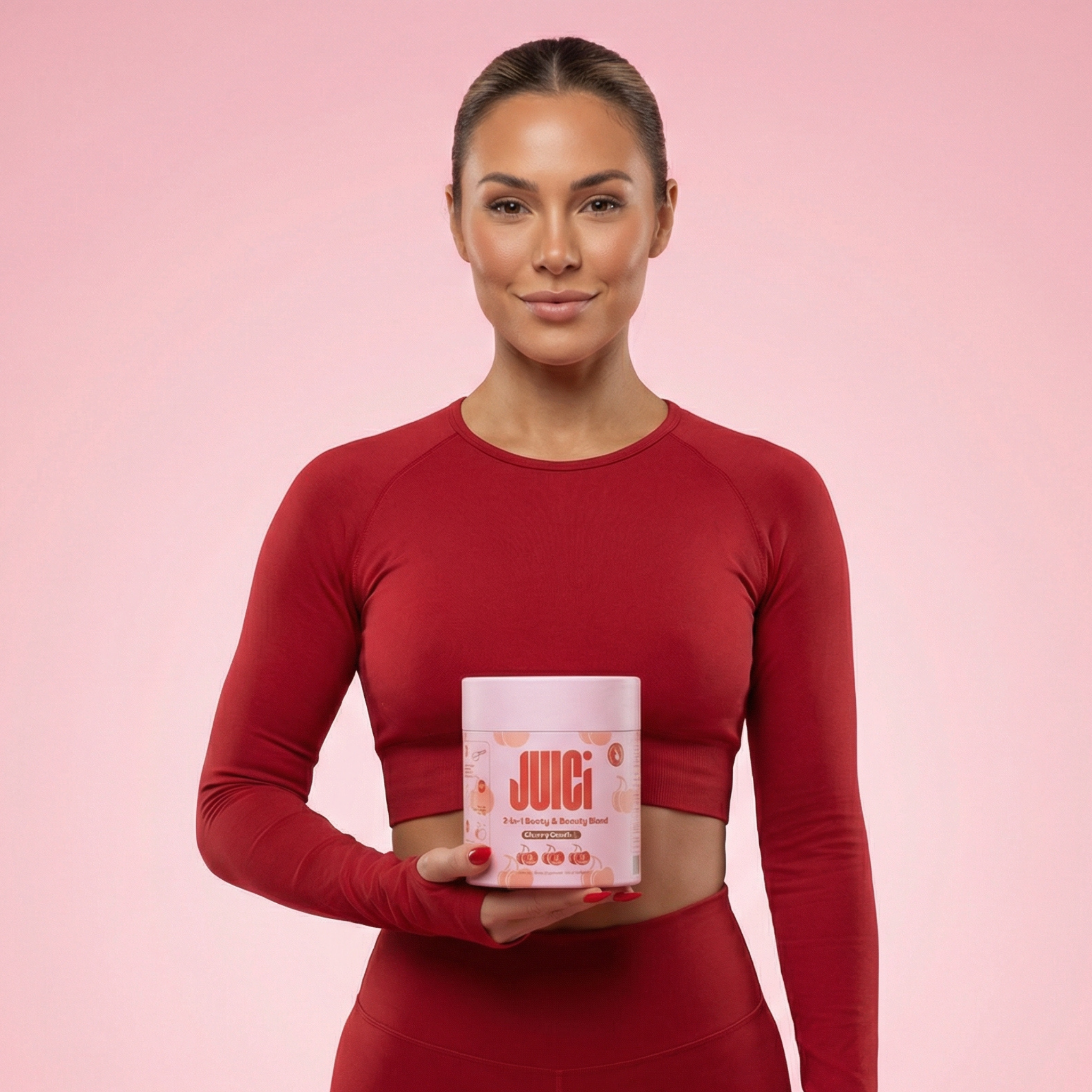 Woman holding the JUICi Booty and Beauty Blend tub